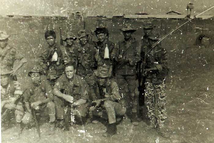 SFC Eddie Hamby posing with troops 1969