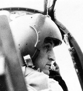 Photo: Wing Commander Larrard, Royal Australian Air Force, at the controls of the Bronco.