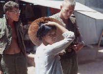 Troops and Viet woman