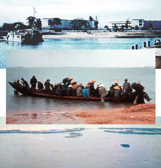 Phu Bai, 1967: Photo of Danang Harbor of a fishing boat under sail. Monkey Mountain can be seen in the background. © 2011 by Ray Cochran