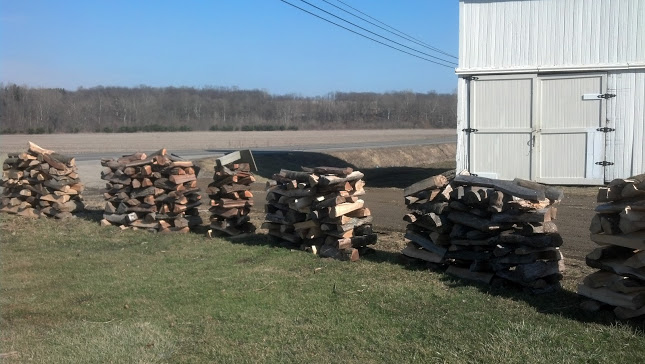 Wood-racks are full of Best of Both Farms' famous Cherry Wood.