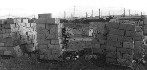 Ration dump located between mid-runway and the Air Force compound