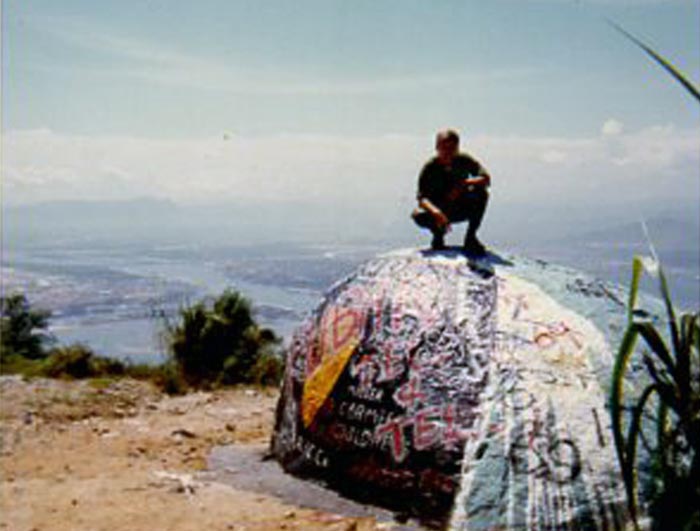 20. Da Nang AB: 366th TFW: Monkey Mountain's Boom-Boom Rock. Units that climbed to the top repainted the rock. 1969. [Peter Halferty photo]. 