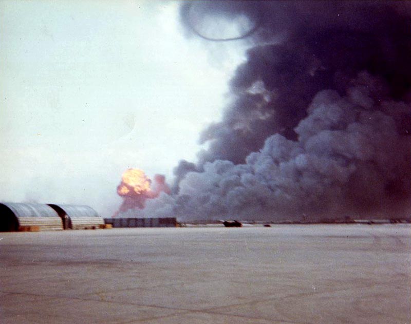 3. Da Nang AB: 366th TFW: Flightline view. Aircraft were quickly towed or taxied north and south or under revetments. Note the giant smoke-ring roiled perfectly to the heavens. April 27-1969. [Peter Halferty photo].