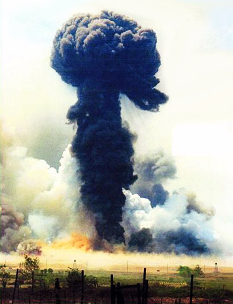 11. Da Nang AB: 366th TFW: Bomb Dump ASP-1 Explosions. Many Army, Air Force, Marines, Navy, ROK soldiers and many civilians lost part or most of their hearing that day. This is not my photo. It was at an LZ just at the end of base
somewhere -- but I remember these colors! Like all those thousands of 50 gallon-drums of Agent Orange that went up as well. The ASP # 1 exploded like this for two days straight. $ Cost 100 mill. Camp Hoover leveled. Camp Monahan heavyly damages. Camp Briggs slight damage. Dog Patch completely destroyed. Hill 10, Hill 55, Hill 34, Hill 37,
Hill 327 destroyed. 38 tons of spent ammo . [Peter Halferty photo].