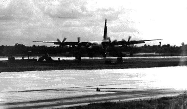 9. Da Nang AB, 366th TFW: C-130 on rolling-takeoff. 1969-1970. [Photo by Ed Burchard].