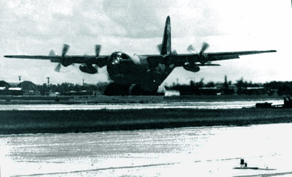 10. Da Nang AB, 366th TFW: C-130 runway lift-off, and landing gear coming up. 1969-1970. [Photo by Ed Burchard].