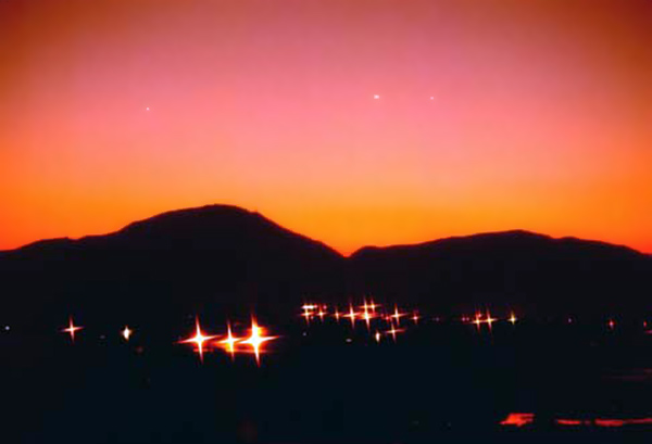 6. Da Nang AB, 366th TFW: Twilight's last gleaming...and if you look closely, can see the first stars appearing. 1969-1970. [Photo by Ed Burchard].