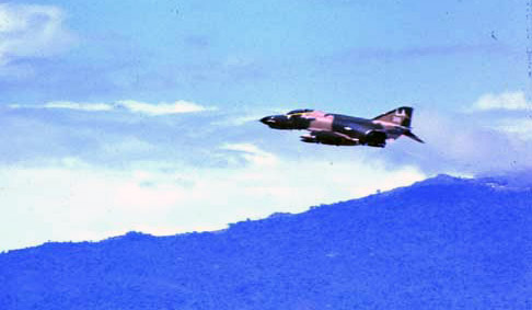9. Da Nang AB, 366th TFW:Morning F-4 Phantom and non afterburners takeoff. 1969-1970. [Photo by Ed Burchard].