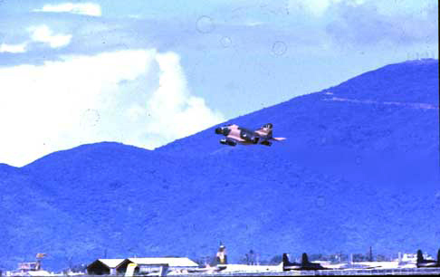 8. Da Nang AB, 366th TFW:Morning F-4 Phantom airborne. 1969-1970. [Photo by Ed Burchard].