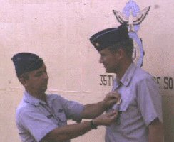 Da Nang Air Base: Base Commander, Colonel Eisenbrown, awards Major Arthur B. Rupert a well deserved BSM w/V for base defense.