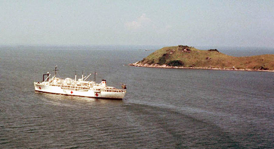 Da Nang Harbor. USS Repose, hospital ship, sails from harbor to points unknown. 