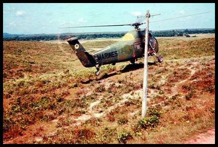 CONVOY-CHOPPER-SUPPORT SUPPLY RUN TO DONG HA- ON HWY 1- I THINK AGENT ORANGE WAS SPRAYED ALONG ROAD TO LESSEN AMBUSHES