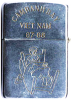 Zippo: (Back) CAM RANH BAY, VIET NAM, 67-68. [Photo: Nude Girl in bed] 1967-1968.