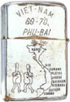 Zippo: (Back) VIET-NAM 69-70, PHU-BAI, (Cartoons) Two dickie-bird-Fingers and Map of N/S Vietnam, 1969-1970