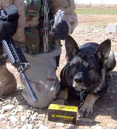 2. Sgt Pablo Martinez and Argo show off Leatherman Surge.