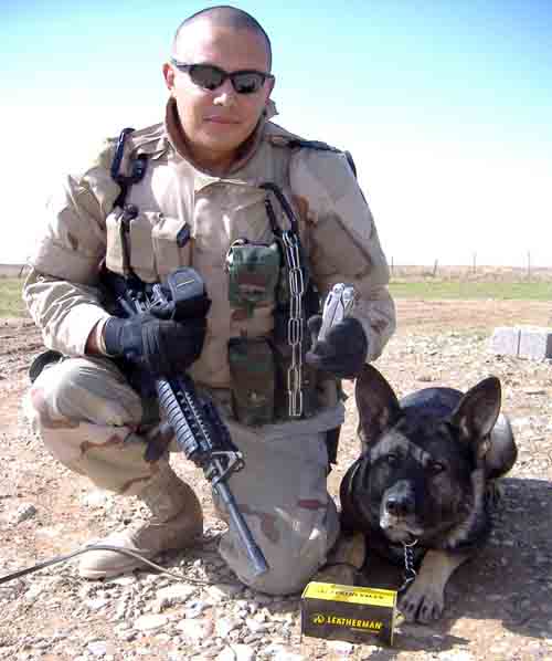 1. Sgt Pablo Martinez and Argo show off Leatherman Surge.